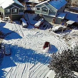 Subaru in the snow, doughnuts in a cul-de-sac - YouTube
